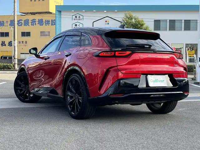 トヨタ クラウン スポーツ Z 愛媛県 2023(令5)年 1万km 赤 メーカーオプション純正ナビ/BT/AM・FM/フルセグTV/ビルトインETC2.0/デジタルインナーミラー/追従型クルーズコントロール/レーンキープアシスト/ブラインドスポットモニター/衝突軽減システム/置くだけ充電/ヘッドライトウォッシャー/電動リアゲート/D+N席パワーシート・シートヒーター・シートクーラー/シートメモリー/本革巻きステアリング/純正アルミホイール/純正フロアマット/フルタイム4WD