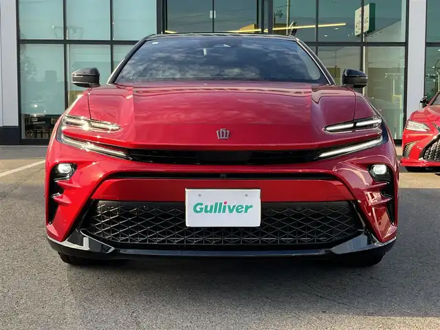 トヨタ クラウン スポーツ Z 愛媛県 2023(令5)年 1万km 赤 メーカーオプション純正ナビ/BT/AM・FM/フルセグTV/ビルトインETC2.0/デジタルインナーミラー/追従型クルーズコントロール/レーンキープアシスト/ブラインドスポットモニター/衝突軽減システム/置くだけ充電/ヘッドライトウォッシャー/電動リアゲート/D+N席パワーシート・シートヒーター・シートクーラー/シートメモリー/本革巻きステアリング/純正アルミホイール/純正フロアマット/フルタイム4WD