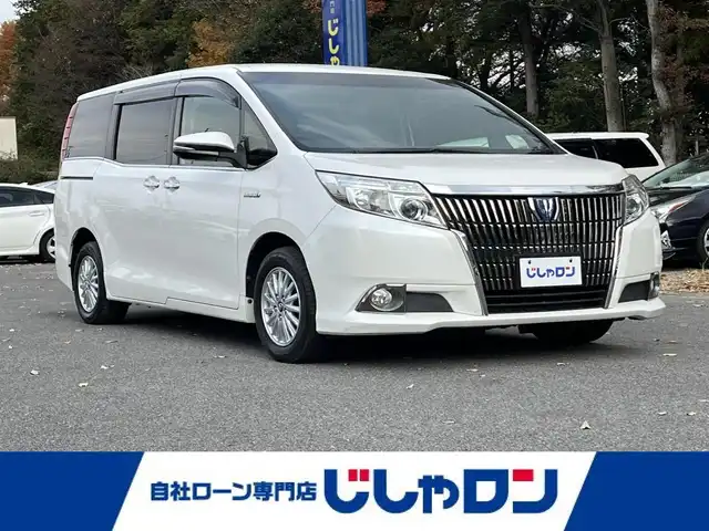 トヨタ エスクァイア ハイブリッド Xi 栃木県 2014(平26)年 12.9万km ホワイトパールクリスタルシャイン (株)IDOMが運営する【じしゃロン宇都宮店】の自社ローン対象車両になります。こちらは現金ご利用時の価格です。自社ローンご希望の方は別途その旨お申付け下さい。/純正ナビ/バックカメラ/フルセグ/Ｂｌｕｅｔｏｏｔｈ/ビルトインＥＴＣ/片側パワースライドドア/シートヒーター/スマートキー/ＬＥＤヘッドライト/オートライト/アイドリングストップ