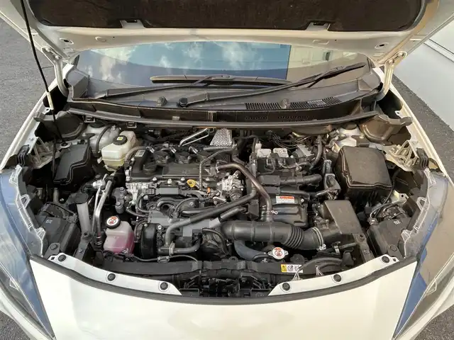 トヨタ ヤリスクロス ハイブリッド Z 佐賀県 2021(令3)年 5.7万km ブラックマイカ/ホワイトパールクリスタルシャイン 2トーン フルモデリスタエアロ/パワーバックドア/純正ディスプレイオーディオ/・ナビキット/・Bluetooth/パノラミックビューモニター/ETC2.0/ブラインドスポットモニター（BSM）/Toyota Safety Sense/・プリクラッシュセーフティ/・レーダークルーズコントロール（全車速追従機能付）/・レーントレーシングアシスト（LTA）/・ロードサインアシスト（RSA）/・オートマチックハイビーム（AHB)/・ロードサインアシスト（RSA)/・パーキングサポートブレーキ（PKSB）/・リヤクロストラフィックアラート（RCTA）/クリアランスソナー/純正18インチアルミホイール/オートホールド/革巻ステアリング/ステアリングスイッチ/ハーフレザー(合皮)/パワーシート/前席シートヒーター/純正フロアマット/純正ラゲージソフトマット/LEDヘッドランプ/オートライト/ヘッドライトレベライザー/プッシュスタート