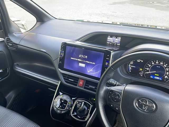 トヨタ ヴォクシー ハイブリッド ZS 煌Ⅱ 大阪府 2019(平31)年 6.4万km イナズマスパーキングブラックガラスフレーク ワンオーナー/ALPINE製11インチナビ（EX11Z）/BT/CD/DVD/フルセグ/全方位カメラ/ALPINE製フリップダウンモニター/両側パワースライドドア/前後ドライブレコーダー/ビルトインETC/クルーズコントロール/衝突軽減ブレーキ/LEDヘッドライト/オートライト/純正16インチAW/純正フロアマット/スマートキープッシュスタート/スペアキー/保証書/取扱説明書