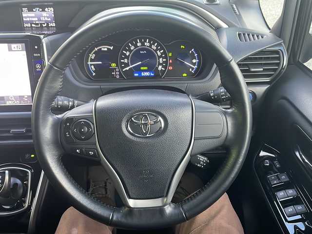 トヨタ ヴォクシー ハイブリッド ZS 煌Ⅱ 大阪府 2019(平31)年 6.4万km イナズマスパーキングブラックガラスフレーク ワンオーナー/ALPINE製11インチナビ（EX11Z）/BT/CD/DVD/フルセグ/全方位カメラ/ALPINE製フリップダウンモニター/両側パワースライドドア/前後ドライブレコーダー/ビルトインETC/クルーズコントロール/衝突軽減ブレーキ/LEDヘッドライト/オートライト/純正16インチAW/純正フロアマット/スマートキープッシュスタート/スペアキー/保証書/取扱説明書