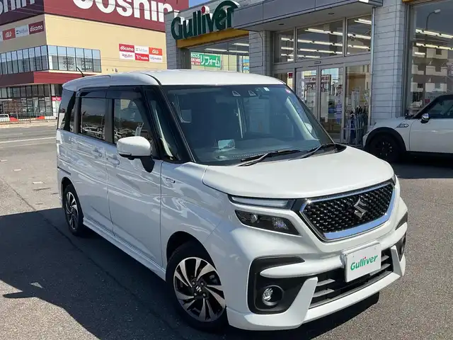 スズキ ソリオ バンディット HV MV 滋賀県 2023(令5)年 2.8万km ピュアホワイトP ワンオーナー/車検8年3月まで/純正9インチメモリナビ（メーカーOP）/　フルセグテレビ　Bluetooth対応/　AppleCarPlay対応/全方位カメラ/ヘッドアップディスプレイ/両側パワースライドドア/運転席&助手席シートヒーター/純正前後2カメラドライブレコーダー（ナビ連動）/純正ビルトインETC/純正LEDヘッドライト/純正15インチアルミホイール/保証書/取扱説明書/スペアキーあり/