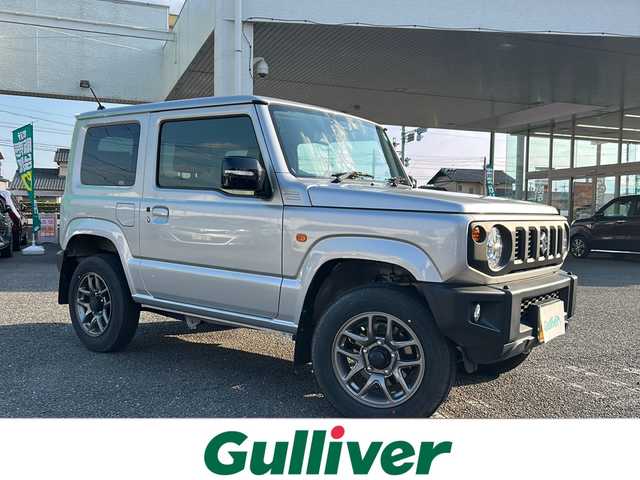 スズキ ジムニー XC 岐阜県 2022(令4)年 1.3万km シルキーシルバーメタリック ５MT/ワンオーナー/シートヒーター/社外ナビ/KENWOOD/地デジテレビ/FM/AM/BTオーディオ/DISK/バックカメラ/デュアルセンサーブレーキサポート/レーンキープアシスト/クルーズコントロール/ヒルディセントコントロール/横滑り防止機能/革巻きステアリング/ステアリングスイッチ/社外デジタルインナーミラー/LEDヘッドライト/フォグライト/ウインカーミラー/ヘッドライトウォッシャー/純正フロアマット車載