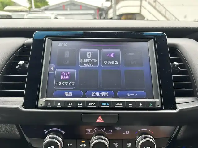 ホンダ フィット ホーム 東京都 2021(令3)年 6.8万km クリスタルブラックパール Honda SENSING/・衝突軽減ブレーキ/・誤発進抑制機能/・後方誤発進抑制機能/・近距離衝突軽減ブレーキ/・歩行者事故低減ステアリング/・路外逸脱抑制機能/・渋滞追従機能付アダプティブ/・クルーズ・コントロール/・車線維持支援システム/・先行車発進お知らせ機能/・標識認識機能/・オートハイビーム/純正メモリナビ（VXM-205VFEi）/・フルセグTV/Bluetooth/AUX/LEDヘッドライト/チップアップシート/電動格納ミラー/取扱説明書/保証書