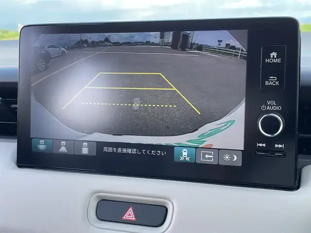 ホンダ ヴェゼル ハイブリッド e:HEV Z PLaYパッケージ 佐賀県 2025(令7)年 0.1千km プレミアムサンライトホワイトパール ワンオーナー/純正9インチHonda CONNECTディスプレイ(ナビ機能付)/・フルセグTV/AM/FM/USB/Bluetooth/・Apple Car Play/Android Auto/バックカメラ/ビルトインETC2.0/ハンズフリーパワーテールゲート(予約クローズ機能付)/電子パーキングブレーキ/・BRAKE HOLD機能/置くだけ充電/ハーフレザーシート/DN席シートヒーター/ISOFIX対応/パドルシフト/革巻きステアリング/ステアリングヒーター/ステアリングリモコン/純正18インチアルミホイール/純正LEDヘッドライト/・アダプティブドライビングビーム/純正LEDフォグランプ/新車保証書/記録簿/取扱説明書/スペアキー１本/ホンダセンシング/・アダプティブクルーズコントロール/・衝突被害軽減ブレーキ/・先行車発進お知らせ機能/・路外逸脱抑制機能/・ブラインドスポットインフォメーション/・パーキングセンサーシステム/・標識認識機能