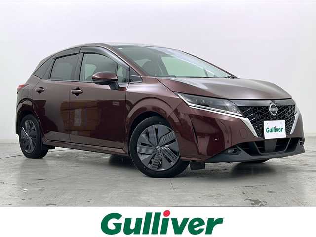 日産 ノート X 宮城県 2021(令3)年 6万km バーガンディー 禁煙車/アラウンドビューモニター/エマージェンシーブレーキ/プロパイロット/側方運転支援/ブラインドスポットモニター/インテリジェントデジタルインナーミラー/メーカーOPナビ/・BT.USB.HDMI.スマホ連携/・フルセグTV/前席シートヒーター/ビルトインETC2.0/純正ドライブレコーダー（FR）/ステアリングヒーター/LEDヘッドライト/プッシュスタート/スマートキー×2/電動パーキングブレーキ/オートホールド/純正フロアマット/純正ドアバイザー/ワイヤレス充電/シートカバ