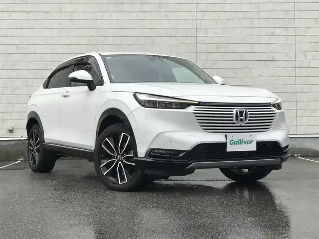 ホンダ ヴェゼル ハイブリッド e:HEV Z 富山県 2021(令3)年 6.4万km プラチナホワイトパール 4WD/純正ナビ/フルセグTV/Bluetooth/全周囲カメラ/衝突被害軽減ブレーキ/コーナーセンサー/レーンキープアシスト/レーダークルーズコントロール/革巻きステアリング/ステアリングスイッチ/ハーフレザーシート/シートヒーター/プッシュスタート/スマートキー/ETC2.0