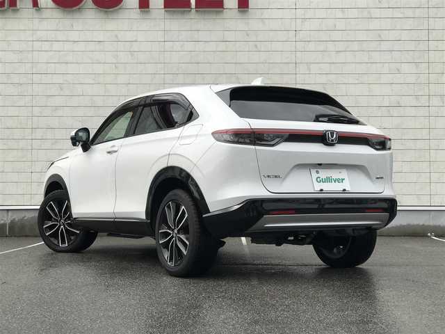 ホンダ ヴェゼル ハイブリッド e:HEV Z 富山県 2021(令3)年 6.4万km プラチナホワイトパール 4WD/純正ナビ/フルセグTV/Bluetooth/全周囲カメラ/衝突被害軽減ブレーキ/コーナーセンサー/レーンキープアシスト/レーダークルーズコントロール/革巻きステアリング/ステアリングスイッチ/ハーフレザーシート/シートヒーター/プッシュスタート/スマートキー/ETC2.0