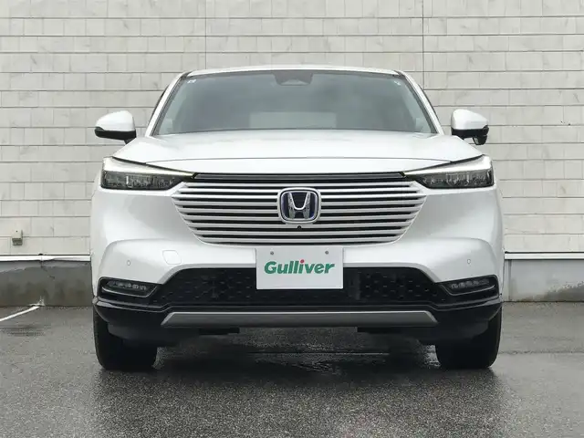 ホンダ ヴェゼル ハイブリッド e:HEV Z 富山県 2021(令3)年 6.4万km プラチナホワイトパール 4WD/純正ナビ/フルセグTV/Bluetooth/全周囲カメラ/衝突被害軽減ブレーキ/コーナーセンサー/レーンキープアシスト/レーダークルーズコントロール/革巻きステアリング/ステアリングスイッチ/ハーフレザーシート/シートヒーター/プッシュスタート/スマートキー/ETC2.0