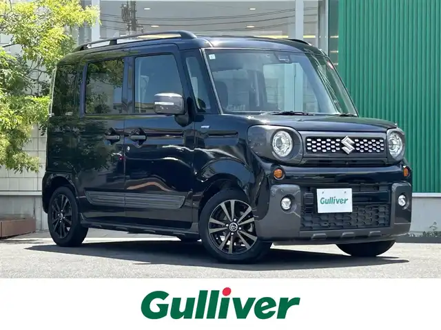 スズキ スペーシア ギア HYBRID XZターボ 岡山県 2019(平31)年 3.3万km ブルーイッシュブラックパール3 純正ナビ　　CN-RZ743W/Bluetooth、AM、FM、フルセグTV、CD、DVD/パドルシフト/両側パワースライドドア/シートバックテーブル/前席シートヒーター/クルーズコントロール（追従機能なし）/スリムサーキュレーター/後席ロールサンシェード/オートライト/レーンキープアシスト/ビルトインETC/純正フロアマット/横滑り防止装置/盗難防止装置/スズキセーフティサポート/・デュアルカメラブレーキサポート/・後退時サポートブレーキ/・車線逸脱抑制機能/・車線逸脱警報機能/・ふらつき警報/・標識認識機能/・先行車発進お知らせ機能