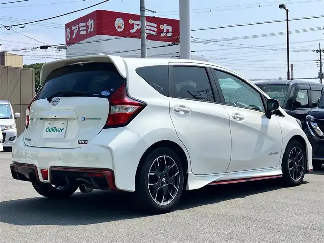 日産 ノート e－パワー ニスモ 福島県 2018(平30)年 4.7万km ブリリアントホワイトパール エンジンスタートボタン/パワーステアリング/パワーウィンドウ/スマートキー/オートエアコン/クルーズコントロール/ETC/全方位カメラ/純正ナビ（CD/DVD）/純正ドライブレコーダー/純正フロアマット/純正アルミホイール/ABS/横滑り防止装置/ナイトビジョン/コーナーセンサー前後/レーンキープアシスト/オートライト/Wエアバック/衝突軽減システム/デジタルインナーミラー/社外アルミ車載（スタッドレス）