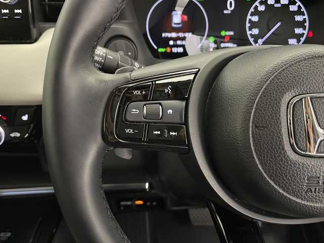 ホンダ ヴェゼル ハイブリッド e:HEV Z 長野県 2024(令6)年 2万km プレミアムサンライトホワイトパール 4WD/寒冷地仕様/ホワイトレザー/純正ナビ/（フルセグ/Bluetooth/AppleCarPlay/AndroidAuto)/バックカメラ/ビルトインETC2.0/衝突軽減ブレーキ/レーンキープアシスト/レーダークルーズコントロール/ブラインドスポットモニター/前後コーナーセンサー/ブラインドスポットモニター/電動リアゲート/踏み間違い防止/前席シートヒーター/ステアリングヒーター/置くだけ充電/電動パーキング/ステアリングスイッチ/スマートキー/スペアキー