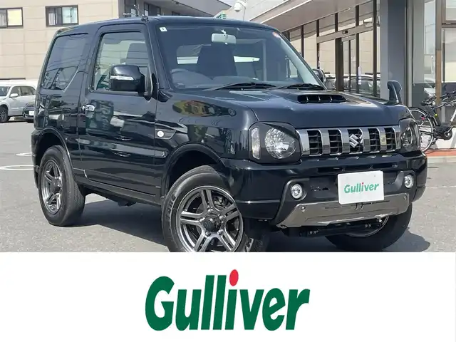 スズキ ジムニー ランドベンチャー 長野県 2018(平30)年 5万km ブルーイッシュブラックパール3 社外ナビ（FM/AM、CD、DVD）/バックカメラ/ワンセグテレビ/ETC/前方ドライブレコーダー/純正フロアマット/背面タイヤ/ダブルエアバック/革ステアリング/キセノンヘッドライト/スペアキー（１本）/純正16AW/保証書、取扱説明書