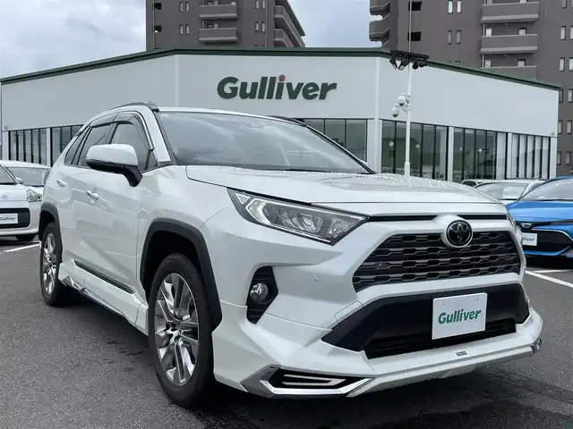 トヨタ ＲＡＶ４ G Zパッケージ 長崎県 2019(令1)年 6.6万km ホワイトパールクリスタルシャイン モデリスタフルエアロ/４ＷＤ/純正９型ナビ/（フルセグ・DVD・CD・SD・BT)/バックカメラ/AC100V/トヨタセーフティセンス/ＬＥＤヘッドライト/オートライト/合皮レザーシート/パワーシート/オートハイビーム/ステアリングスイッチ/シートメモリー/前席シートヒーター/レーンキープアシスト/クリアランスソナー/デジタルミラー/ETC2.0/純正フロアマット/スペアキー