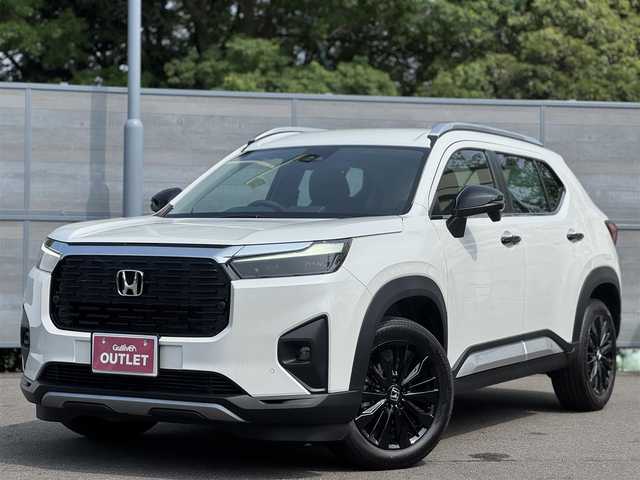 ホンダ ＷＲ－Ｖ Z+ ブラックスタイル 三重県 2025(令7)年 0.1万km未満 プラチナホワイトパール 登録未使用車/ホンダセンシング /・衝突軽減ブレーキ/・誤発進抑制機能/・後方誤発進抑制機能/・近距離衝突軽減ブレーキ/・歩行者事故低減ステアリング/・路外逸脱抑制機能/・アダプティブクルーズコントロール/・車線維持支援システム/・先行車発進お知らせ機能/・標識認識機能/・オートハイビーム/・パーキングセンサーシステム/ナビ装着用スペシャルパッケージ/・ステアリングスイッチ/　(オーディオ/ナビ/ハンズフリー/音声認識)/・リアワイドカメラ/・車載通信機/・Bluetoothユニット/パドルシフト/USBジャック(運転席)/充電用USBジャック(助手席)/純正17インチ5本マルチスポークフルブラック塗装アルミホイール/ブラックドアミラー/ブラックアウトサイドドアハンドル/シルバールーフレール/フルLEDヘッドランプ/・オートライト/LEDフロントフォグランプ/プッシュエンジンスタート/スマートキー×2