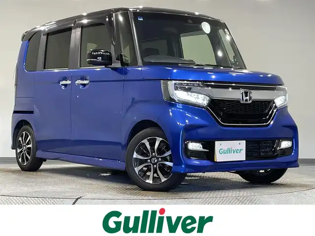 ホンダ Ｎ ＢＯＸ カスタム G L ホンダセンシング 愛知県 2020(令2)年 2.7万km ブリリアントスポーティブルーメタリック2トーン 純正ＳＤナビ　/(CD・DVD再生/FM/AM/地デジ/iPod/SD/Bluetooth)/ホンダセンシング/　　-衝突軽減ブレーキ（CMBS)/　　-レーダークルーズコントロール　/　　-先行車発進お知らせ/　　-路外逸脱抑制機能/　　-標識認識機能/　　-車線維持支援システム/　　-オートハイビーム/　　-誤発進抑制機能/ビルトインＥＴＣ　/ＬＥＤヘッドライト　/ＬＥＤフォグランプ　/パワースライドドア　/プッシュスタート　/　　-スマートキー/バックカメラ　/ドライブレコーダー　/USB接続/ISOFIX/純正フロアマット/純正14インチAW