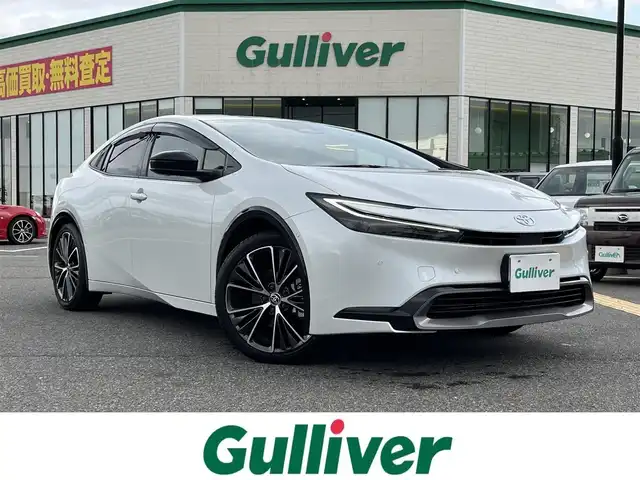 トヨタ プリウス Z 鳥取県 2023(令5)年 0.4万km プラチナホワイトパールマイカ ４・W・D/純正12.3インチDPオーディオ/フルセグ/BT/Mira/パノラミックビューモニター/デジタルミラー・ETC2.0/トヨタチームメイト/トヨタセーフティセンス/ブラインドスポットモニター/パーキングアシスト/合皮レザーシート/前席シートヒーター/エアシート/運転席パワーシート/メモリ機能付き/パワーバックドア/タイプC接続・ワイヤレス充電/LEDヘットライト/純正19インチアルミホイール/プッシュエンジンスタート/フロアマット
