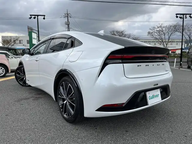 トヨタ プリウス Z 鳥取県 2023(令5)年 0.4万km プラチナホワイトパールマイカ ４・W・D/純正12.3インチDPオーディオ/フルセグ/BT/Mira/パノラミックビューモニター/デジタルミラー・ETC2.0/トヨタチームメイト/トヨタセーフティセンス/ブラインドスポットモニター/パーキングアシスト/合皮レザーシート/前席シートヒーター/エアシート/運転席パワーシート/メモリ機能付き/パワーバックドア/タイプC接続・ワイヤレス充電/LEDヘットライト/純正19インチアルミホイール/プッシュエンジンスタート/フロアマット