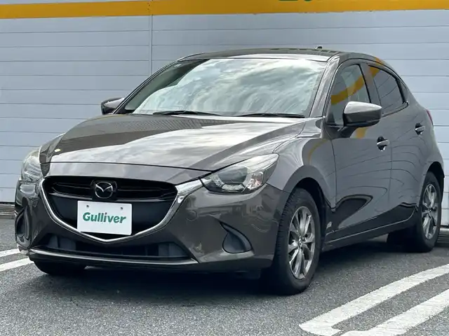 マツダ デミオ 13S ツーリング 埼玉県 2017(平29)年 11.3万km チタニウムフラッシュマイカ プッシュスタート/衝突被害軽減ブレーキ/レーンアシスト/DVD再生/バックカメラ/Bluetooth接続/フルセグテレビ/純正メモリナビ/フロアマット/コーナーセンサー/クルーズコントロール/横滑り防止装置/アイドリングストップ/ETC/パーキングアシスト/ABS/シートヒーター/AAC/PW/PS/オートライト/BSM/USB接続端子/ドライブレコーダー/純正アルミホイール