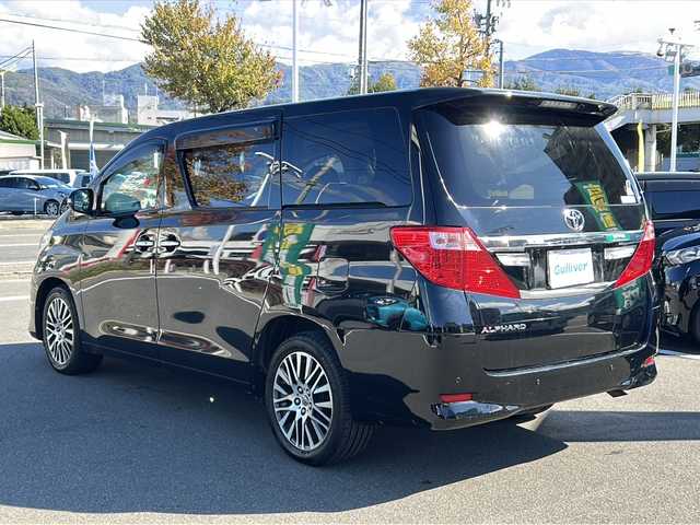 トヨタ アルファード 240G 長野県 2012(平24)年 11.5万km ブラック 禁煙車/4WD/社外ナビ（CD/DVD/フルセグTV）/バックカメラ/ビルトインETC/アルパインフリップダウンモニター/両側パワースライドドア/前席パワーシート（運転席メモリー機能付）/クルーズコントロール/ウッドコンビステアリング/ステアリングスイッチ/スマートキー/Pスタート/電動格納ミラー/純正18インチAW/純正フロアマット