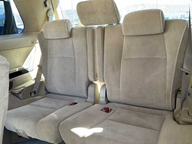 トヨタ アルファード 240G 長野県 2012(平24)年 11.5万km ブラック 禁煙車/4WD/社外ナビ（CD/DVD/フルセグTV）/バックカメラ/ビルトインETC/アルパインフリップダウンモニター/両側パワースライドドア/前席パワーシート（運転席メモリー機能付）/クルーズコントロール/ウッドコンビステアリング/ステアリングスイッチ/スマートキー/Pスタート/電動格納ミラー/純正18インチAW/純正フロアマット