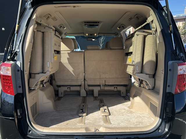 トヨタ アルファード 240G 長野県 2012(平24)年 11.5万km ブラック 禁煙車/4WD/社外ナビ（CD/DVD/フルセグTV）/バックカメラ/ビルトインETC/アルパインフリップダウンモニター/両側パワースライドドア/前席パワーシート（運転席メモリー機能付）/クルーズコントロール/ウッドコンビステアリング/ステアリングスイッチ/スマートキー/Pスタート/電動格納ミラー/純正18インチAW/純正フロアマット