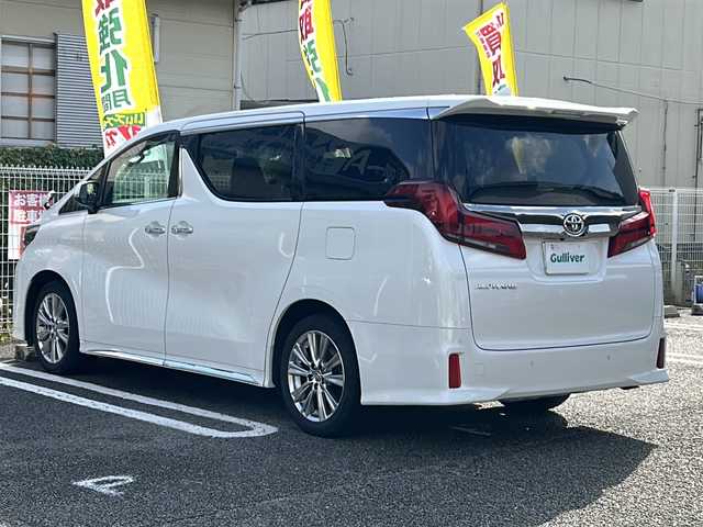 トヨタ アルファード S タイプゴールド 兵庫県 2021(令3)年 4.7万km ホワイトパールクリスタルシャイン ワンオーナー/7人乗り/純正9インチナビ/バックカメラ/純正フリップダウンモニター/セーフティセンス/レーダークルーズコントロール/インテリジェントクリアランスソナー/OP/デジタルインナーミラー/ブラインドスポットモニター/リアクロストラフィックオートブレーキ/3眼LEDヘッドランプ/LEDコーナリングランプ/シーケンシャルターンランプ/パワーバックドア/両側パワースライドドア/ETC2.0/応急用タイヤ/合皮ハーフレザーシート/保証書/取説/スペアキー1本