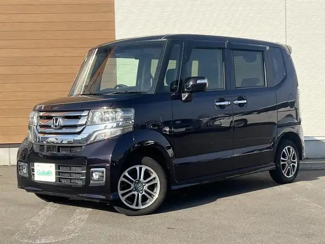 ホンダ Ｎ ＢＯＸ カスタム G SSパッケージ 秋田県 2017(平29)年 7.2万km プレミアムベルベットパープル・パール ４WD/両側パワースライドドア/衝突軽減システム/社外メモリナビ（DVD/CD/BT/AM/FM）/フルセグ（走行中視聴可能）/バックカメラ/ホンダ純正１４インチアルミ（夏タイヤ装着）/スマートキー/アイドリングストップ/プッシュスタート/ステアリングスイッチ/前席シートヒーター/ビルトインETC/純正フロアマット/社外ドアバイザー/オートライト/オートエアコン/パワーステアリング/パワーウィンドウ/横滑り防止/盗難防止装置/寒冷地仕様/電動格納ウィンカーミラー/保証書/取扱説明書/記録簿