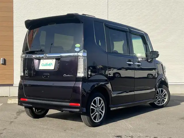 ホンダ Ｎ ＢＯＸ カスタム G SSパッケージ 秋田県 2017(平29)年 7.2万km プレミアムベルベットパープル・パール ４WD/両側パワースライドドア/衝突軽減システム/社外メモリナビ（DVD/CD/BT/AM/FM）/フルセグ（走行中視聴可能）/バックカメラ/ホンダ純正１４インチアルミ（夏タイヤ装着）/スマートキー/アイドリングストップ/プッシュスタート/ステアリングスイッチ/前席シートヒーター/ビルトインETC/純正フロアマット/社外ドアバイザー/オートライト/オートエアコン/パワーステアリング/パワーウィンドウ/横滑り防止/盗難防止装置/寒冷地仕様/電動格納ウィンカーミラー/保証書/取扱説明書/記録簿