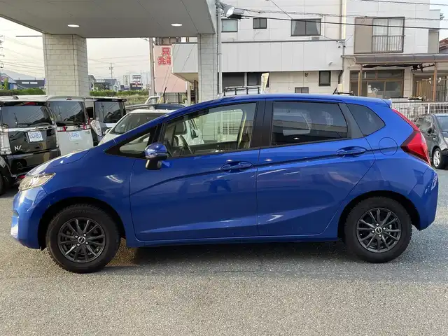 ホンダ フィット 13G Lパッケージ 愛知県 2016(平28)年 3.6万km 青 (株)IDOMが運営する【じしゃロン豊川店】の自社ローン専用車両になります。こちらは現金またはオートローンご利用時の価格です。自社ローンご希望の方は別途その旨お申付け下さい/ワンオーナー/純正メモリナビ（VXM-164VFi）/フルセグTV/DVD/Bluetoothオーディオ/衝突被害軽減ブレーキ/バックカメラ/ドライブレコーダー（FT-DRZERO）/Lパッケージ/LEDヘッドライト/クルーズコントロール/純正フロアマット/保証書/取扱説明書/スマートキー/社外アルミホイール/スタッドレスタイヤ積込