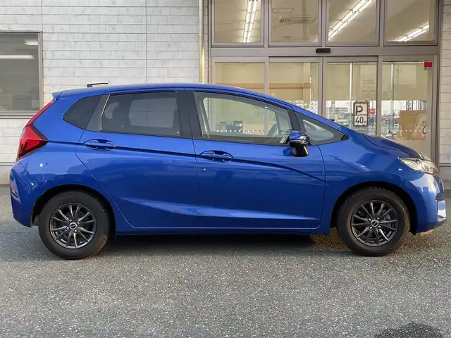 ホンダ フィット 13G Lパッケージ 愛知県 2016(平28)年 3.6万km 青 (株)IDOMが運営する【じしゃロン豊川店】の自社ローン専用車両になります。こちらは現金またはオートローンご利用時の価格です。自社ローンご希望の方は別途その旨お申付け下さい/ワンオーナー/純正メモリナビ（VXM-164VFi）/フルセグTV/DVD/Bluetoothオーディオ/衝突被害軽減ブレーキ/バックカメラ/ドライブレコーダー（FT-DRZERO）/Lパッケージ/LEDヘッドライト/クルーズコントロール/純正フロアマット/保証書/取扱説明書/スマートキー/社外アルミホイール/スタッドレスタイヤ積込