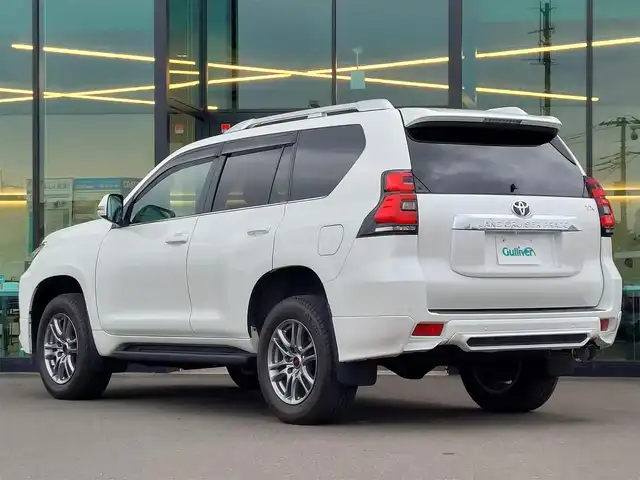 トヨタ ランドクルーザー プラド TX Lパッケージ 東京都 2019(令1)年 1.6万km ホワイトパールクリスタルシャイン サンルーフ/TRDエアロ/TRD18インチAW/ルーフレール/社外メモリナビ/バックカメラ/ビルトインETC/レーダークルーズコントロール/トヨタセーフティセンス/コーナーセンサー/レザーシート/パワーシート/シートヒーター/ベンチレーションシート/LEDヘッドライト/オートマチックハイビーム