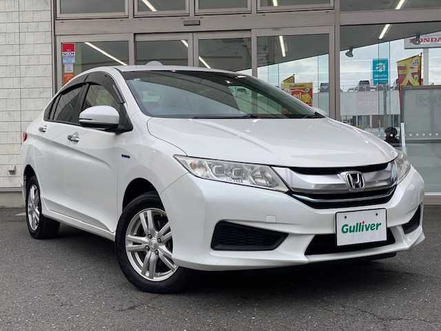 ホンダ グレイス ハイブリッド LX 青森県 2014(平26)年 11.2万km ホワイトオーキッドパール 純正ナビ(BT/ワンセグ/CD/DVD/ラジオ)/バックカメラ/クルーズコントロール/LEDヘッドライト/オートライト/前席シートヒーター/VSAエマージェンシーストップシグナル/ヒルスタートアシスト/ドライブレコーダー(前方)/スペアキー/スマートキー/新車時保証書/取扱説明書/記録簿(H29/H30/R1/R3/R5)