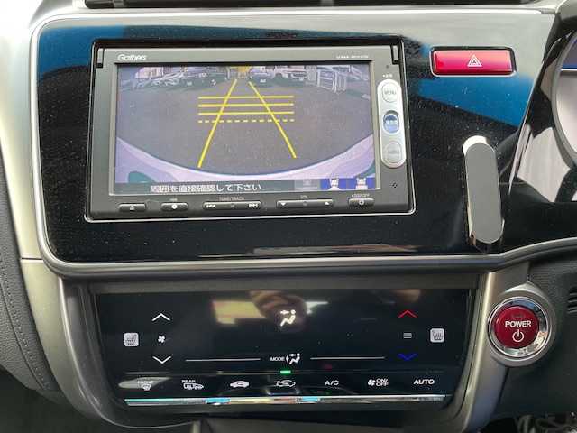 ホンダ グレイス ハイブリッド LX 青森県 2014(平26)年 11.2万km ホワイトオーキッドパール 純正ナビ(BT/ワンセグ/CD/DVD/ラジオ)/バックカメラ/クルーズコントロール/LEDヘッドライト/オートライト/前席シートヒーター/VSAエマージェンシーストップシグナル/ヒルスタートアシスト/ドライブレコーダー(前方)/スペアキー/スマートキー/新車時保証書/取扱説明書/記録簿(H29/H30/R1/R3/R5)