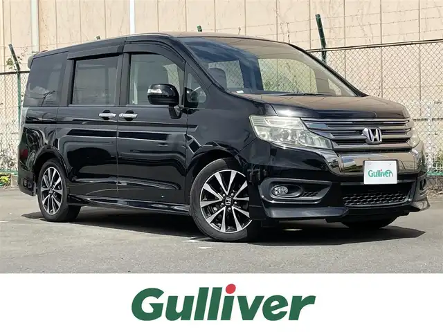 ホンダ ステップワゴン 東京都 2014(平26)年 7.7万km プレミアムスパークルブラックパール ベットキッド/社外メモリナビフルセグ　/・ＢｌｕｅｔｏｏｔｈＡｕｄｉｏ　/・CD/SD/DVD/AM/FM/両側パワースライドドア　/キセノンヘッドライト　/クルーズコントロール　/ハーフレザーシート/社外バックカメラ　/パドルシフト　/スマートキー　/純正アルミホイール/社外ETC/電動格納ミラー