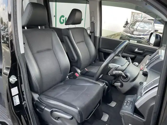 ホンダ ステップワゴン 東京都 2014(平26)年 7.7万km プレミアムスパークルブラックパール ベットキッド/社外メモリナビフルセグ　/・ＢｌｕｅｔｏｏｔｈＡｕｄｉｏ　/・CD/SD/DVD/AM/FM/両側パワースライドドア　/キセノンヘッドライト　/クルーズコントロール　/ハーフレザーシート/社外バックカメラ　/パドルシフト　/スマートキー　/純正アルミホイール/社外ETC/電動格納ミラー