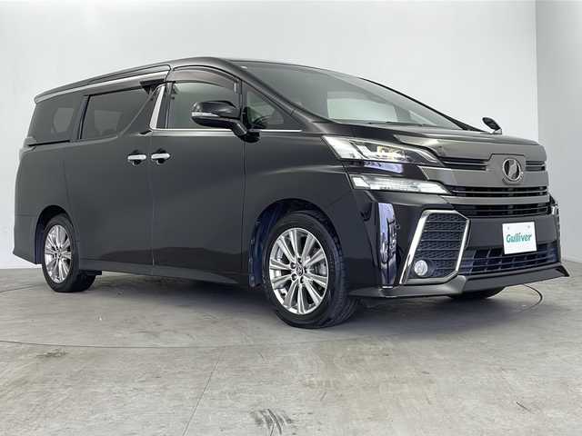 トヨタ ヴェルファイア Z Aエディション ゴールデンアイズ 鹿児島県 2016(平28)年 4.9万km バーニングブラッククリスタルシャインガラスフレーク 純正ナビ/（CD/DVD/BT/フルセグTV）/純正フリップダウンモニター/クルーズコントロール/両側パワースライドドア/ハーフレザーシート/オットマン/ビルトインETC/AC100V/純正ドライブレコーダー/純正フロアマット/純正AW/MTモード付AT/スマートキー/プッシュスタート/取説、保証書