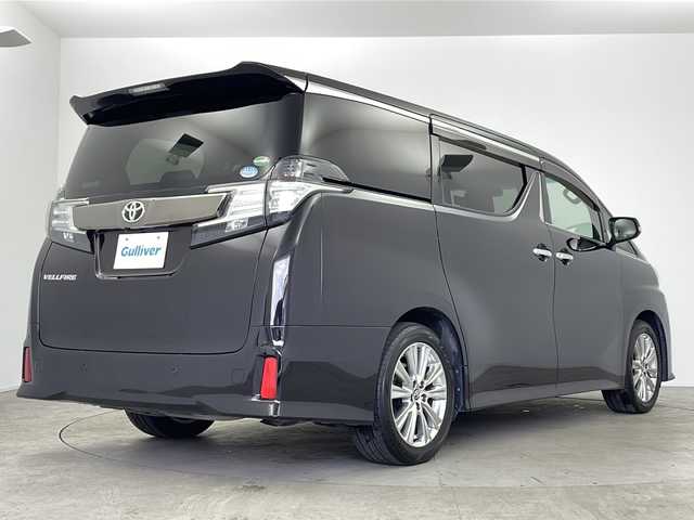 トヨタ ヴェルファイア Z Aエディション ゴールデンアイズ 鹿児島県 2016(平28)年 4.9万km バーニングブラッククリスタルシャインガラスフレーク 純正ナビ/（CD/DVD/BT/フルセグTV）/純正フリップダウンモニター/クルーズコントロール/両側パワースライドドア/ハーフレザーシート/オットマン/ビルトインETC/AC100V/純正ドライブレコーダー/純正フロアマット/純正AW/MTモード付AT/スマートキー/プッシュスタート/取説、保証書