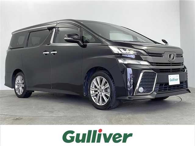 トヨタ ヴェルファイア Z Aエディション ゴールデンアイズ 鹿児島県 2016(平28)年 4.9万km バーニングブラッククリスタルシャインガラスフレーク 純正ナビ/（CD/DVD/BT/フルセグTV）/純正フリップダウンモニター/クルーズコントロール/両側パワースライドドア/ハーフレザーシート/オットマン/ビルトインETC/AC100V/純正ドライブレコーダー/純正フロアマット/純正AW/MTモード付AT/スマートキー/プッシュスタート/取説、保証書