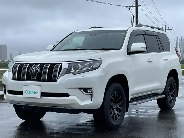トヨタ ランドクルーザー プラド TX Lパッケージ 佐賀県 2021(令3)年 4.5万km ホワイトパールクリスタルシャイン ワンオーナー/サンルーフ/黒革シート/純正９インチナビ/・フルセグTV/AM/FM/USB/Bluetooth/全周囲カメラ/ビルトインETC2.0/D＋N席パワーシート/D＋N席シートヒーター・エアシート/ISOFIX対応/革巻きステアリング/ステアリングリモコン/社外(RAYS)17インチアルミホイール/オートマチックハイビーム/純正LEDヘッドライト/純正LEDフォグライト/純正フロアマット/純正ドアバイザ―/新車保証書/取扱説明書/スペアキー１本/トヨタセーフティセンス/・レーダークルーズコントロール/・レーンディパーチャーアラート/・クリアランスソナー/・プリクラッシュブレーキ/・ブラインドスポットモニター/・ロードサインアシスト