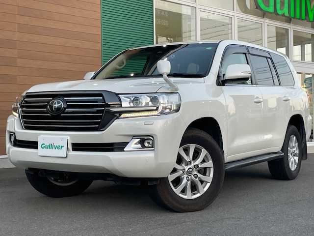 トヨタ ランドクルーザー AX Gセレクション 静岡県 2017(平29)年 4万km ホワイトパールクリスタルシャイン ワンオーナー/純正メモリナビ/(FM/AM/CD/DVD/BT/フルセグTV)/プリクラッシュセーフティ/レーンキープアシスト/クルーズコントロール/オートハイビーム/センターデフロック/ステアリングスイッチ/ベージュレザーシート/ビルトインETC2.0/前後ドライブレコーダー/前席パワーシート/前席＆２列目シートヒーター/サイドステップ/ステアリングヒーター/コーナーセンサー/スマートキー×２/プッシュスタート/保証証/取扱説明書