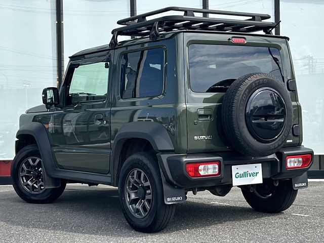 スズキ ジムニー シエラ JC 山形県 2022(令4)年 3.9万km ジャングルグリーン ４WD/デュアルセンサーブレーキサポート/社外SDナビ/（AM/FM/TV/CD/DVD/BT）/純正AW/背面タイヤあり/ETC/ルーフキャリア/バックカメラ/純正ドライブレコーダー前後/社外フロアマット/シートヒーター/レーンキープアシスト/オートライト/フォグランプ/電動格納ミラー/スタッドレスタイヤ車載