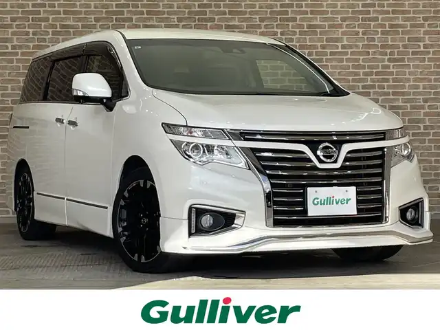日産 エルグランド 250HWS S アーバンクロム 岩手県 2019(令1)年 5.7万km ブリリアントホワイトパール ワンオーナー/4WD/純正ナビ/DVD/CD/MSV/フルセグTV/全周囲カメラ/ハーフレザーシート/両側パワースライドドア/純正エアロ/NISMO１９インチアルミホイール/純正LEDヘッドライト/純正フォグランプ/オートライト/パワーバックドア/ウッドコンビステアリング/ステアリングスイッチ/クルーズコントロール/ウッド調パネル/助手席/セカンドシートオットマン/衝突被害軽減ブレーキ/LKA/横滑り防止/コーナーセンサー/スマートキー×２/ビルトインETC/純正フロアマット/ドアバイザー/電動格納ウインカードアミラー
