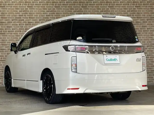 日産 エルグランド 250HWS S アーバンクロム 岩手県 2019(令1)年 5.7万km ブリリアントホワイトパール ワンオーナー/4WD/純正ナビ/DVD/CD/MSV/フルセグTV/全周囲カメラ/ハーフレザーシート/両側パワースライドドア/純正エアロ/NISMO１９インチアルミホイール/純正LEDヘッドライト/純正フォグランプ/オートライト/パワーバックドア/ウッドコンビステアリング/ステアリングスイッチ/クルーズコントロール/ウッド調パネル/助手席/セカンドシートオットマン/衝突被害軽減ブレーキ/LKA/横滑り防止/コーナーセンサー/スマートキー×２/ビルトインETC/純正フロアマット/ドアバイザー/電動格納ウインカードアミラー