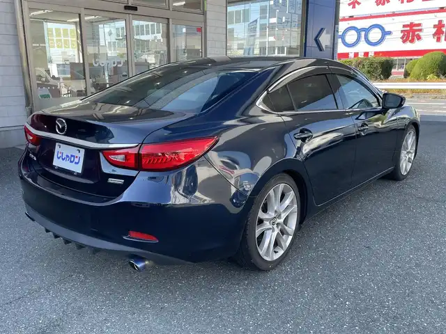 マツダ アテンザ セダン 25S Lパッケージ 愛知県 2014(平26)年 8.7万km ディープクリスタルブルーマイカ (株)IDOMが運営する【じしゃロン豊川店】の自社ローン対象車両になります。こちらは現金ご利用時の価格です。自社ローンご希望の方は別途その旨お申付け下さい。/ 純正メモリナビ/　〇 フルセグTV/　〇 BT対応/ バックカメラ/ ETC/ ステアリングスイッチ/ クルーズコントロール/ パドルシフト/ レザーシート/ 前席シートヒーター/ D席パワーシート/ ドアバイザー/ ウインカーミラー/ 純正フロアマット