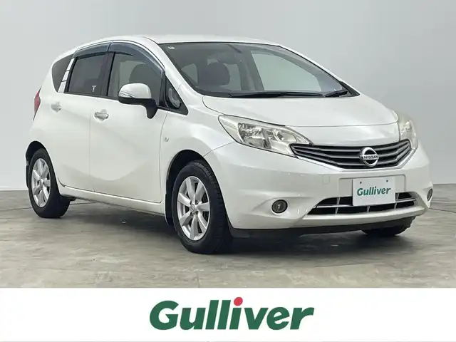 日産 ノート メダリスト 千葉県 2012(平24)年 7.9万km ブリリアントホワイトパール 禁煙車/純正７型メモリナビ/・型番：MC312D-W/・CD/DVD/USB/Bluetooth/フルセグTV/・アラウンドビューモニター/・ビルトインETC/・インテリジェントルームミラー/革巻きステアリング/純正フロアマット/純正15インチAW/オートライト/・ハロゲンヘッドライト/・フォグランプ/・ヘッドライトレベライザー/プッシュスタート&スマートキー