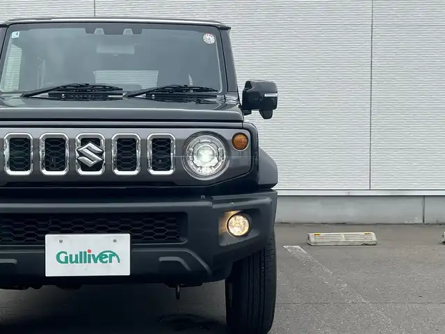スズキ ジムニー ノマド FC 秋田県 2025(令7)年 0.1万km 黒 ４WD/衝突軽減システム/LEDヘッドライト/純正アルミ/スマートキー/アイドリングストップ/コーナーセンサー/クルーズコントロール/オートマチックハイビーム/レーンキープアシスト/プッシュスタート/ダウンヒルアシストコントロール/ステアリングスイッチ/背面タイヤ/ヘッドライトウォッシャー/ミラーヒーター/オートライト/オートエアコン/パワーステアリング/パワーウィンドウ/レベライザー/横滑り防止/電動格納ウィンカーミラー/保証書/取扱説明書/記録簿