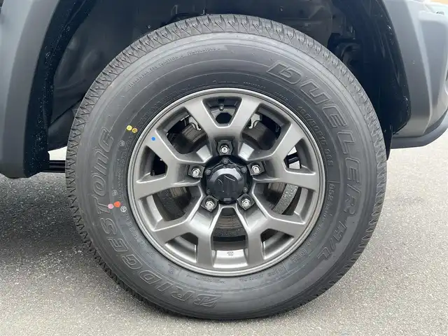 スズキ ジムニー ノマド FC 秋田県 2025(令7)年 0.1万km 黒 ４WD/衝突軽減システム/LEDヘッドライト/純正アルミ/スマートキー/アイドリングストップ/コーナーセンサー/クルーズコントロール/オートマチックハイビーム/レーンキープアシスト/プッシュスタート/ダウンヒルアシストコントロール/ステアリングスイッチ/背面タイヤ/ヘッドライトウォッシャー/ミラーヒーター/オートライト/オートエアコン/パワーステアリング/パワーウィンドウ/レベライザー/横滑り防止/電動格納ウィンカーミラー/保証書/取扱説明書/記録簿