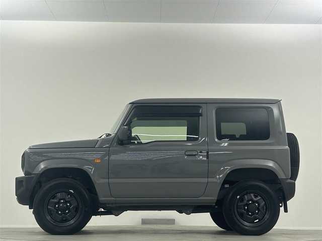 スズキ ジムニー XL 埼玉県 2023(令5)年 0.7万km ミディアムグレー 禁煙車　純正ナビ　CD　DVD　BT　フルセグTV　シートヒーター　ETC　電格ミラー　背面タイヤ　ダウンヒルアシストコントロール　アンチブレーキシステム　横滑り防止装置　オートライト